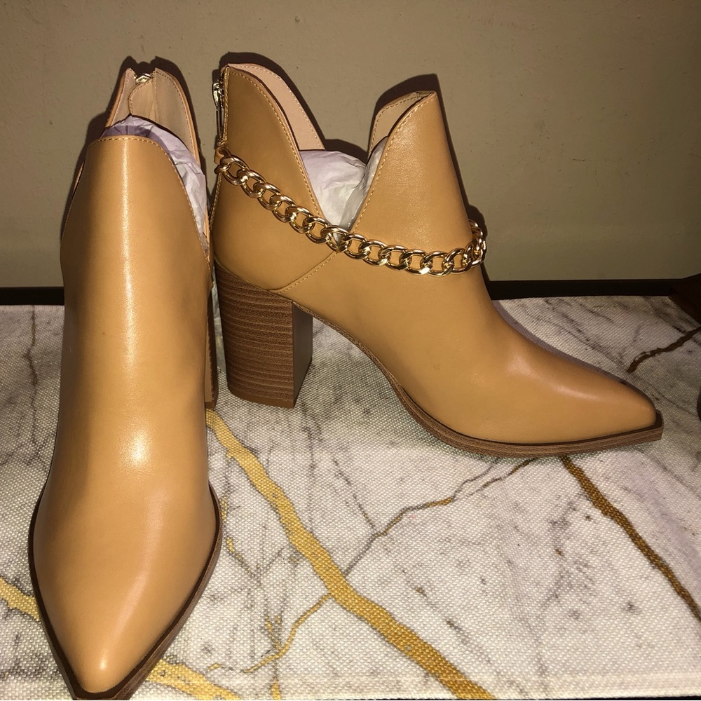 Classic Winter Western Style cut out ankle booties with almond toe; very nice